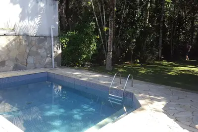 Image de Maison 4 chambres à coucher Riviera de São Lourenço-Bertioga - 2 suites