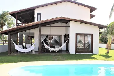 Image de CasadePraia / ParaísoemGuarajuba / WiFi / vaste zone / piscine / barbecue