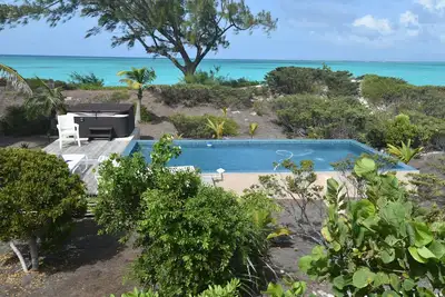 Image de Isolé 4 acres 2 maître Br 410 pieds sur la plage Tar Bay piscine bain à remous voiture salle de sport bateau