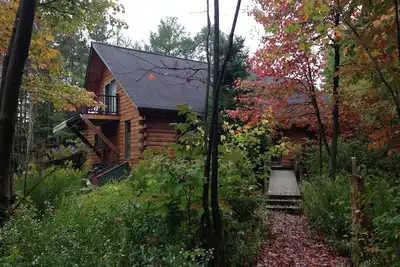 Image de Cabane en rondins dans les bois