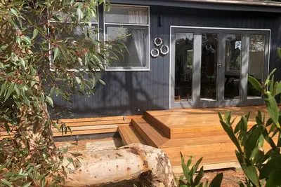 Image de Ceci est la vraie affaire, une maison de plage élégante et confortable des années 1960.