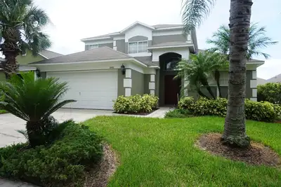 Image de Magie de vacances! 5 Br / 3 B Accueil avec piscine près des parcs à thème