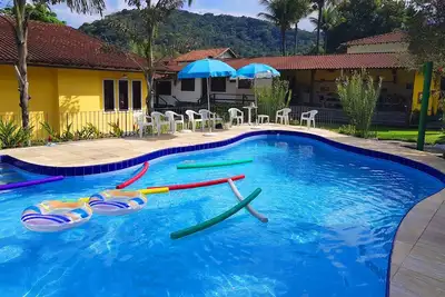 Image de Belle maison à Guapimirim avec 7 suites avec air conditionné