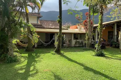 Image de Guaecá - maison communautaire fermée, à 90 m de la plage accès à la plage par le jardin.