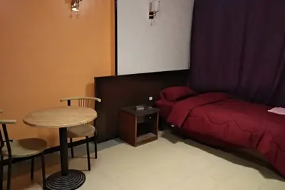 Image de Chambre privée avec salle de bain attenante (dans l'Oasis Hotel Down Town)