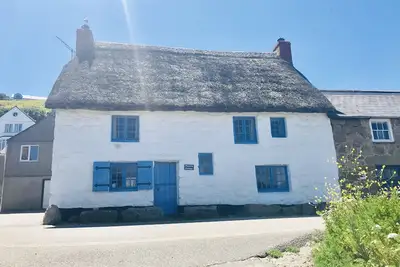 Image de Chaumière avec vue sur mer situé à seulement Yards De La Plage