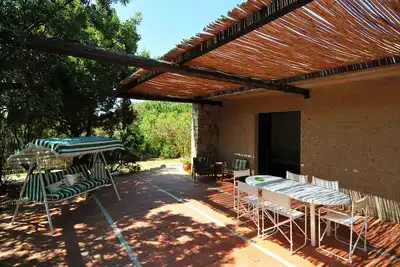 Image de Villasimius, maison avec jardin à 100 m. de la mer