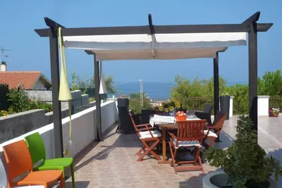 Image de Porto Alabe: Appartement - Tresnuraghesmaison avec une vaste vue sur la mer et ses couchers de sole