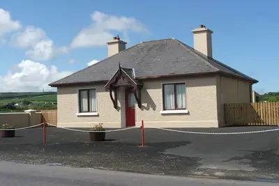 Image de Cottage détaché sur la voie sauvage de l'Atlantique, Ballybunion.