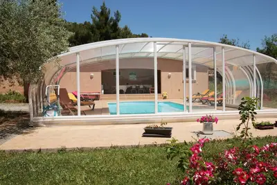Image de Villa 1 ch, 2p, climatisée avec piscine partagée, chauffée et couverte
