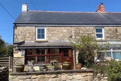 Image de Magnifique chalet en granit avec parking et jardin. Près de la côte. Chiens bienvenus.