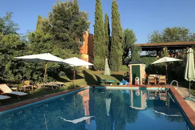 Image de Podere Marchiano, ancienne ferme entièrement restaurée dans le style toscan.
