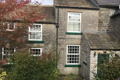 Image de Smithy Cottage; confortable chalet du 18ème siècle. Dans le Peak District Park