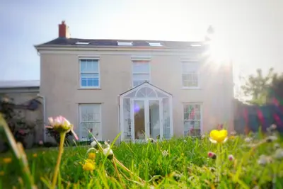 Image de Cour Des Collines. 11 couchages. Conviendrait à 2-3 familles. Braunton. Une vue imprenable