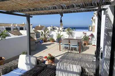 Image de Première ligne de plage avec grande terrasse privée