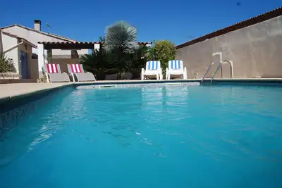 Image de Palm Villa, Maison individuelle avec piscine privée et à seulement 5 Miles To The Beach