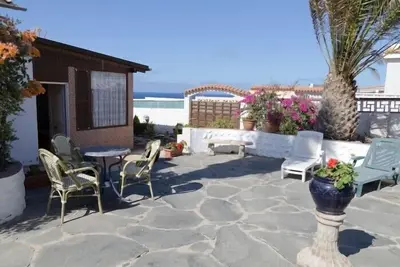 Image de Cottage avec grand jardin sur la plage
