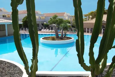 Image de Fantastique maison de ville de 3 chambres avec grenier pour 6 sur Golf Del Sur, Tenerife