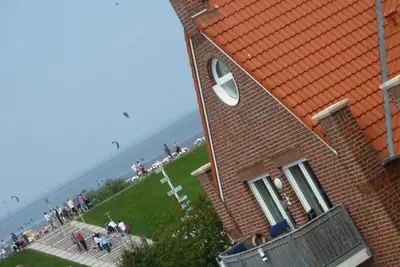 Image de Le 4 **** FeWo - 1 à 4 personnes est à seulement 100 mètres de la mer du Nord