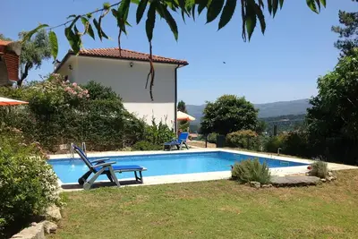 Image de Pure détente! Maison de vacances lumineuse dans un endroit calme avec piscine