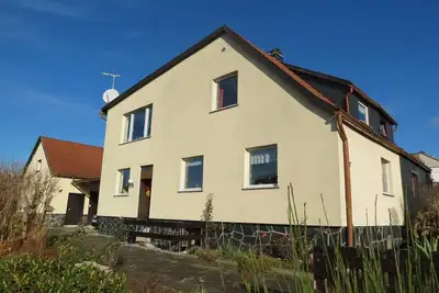 Image de Maison de vacances confortable et familiale avec cheminée dans la forêt de Thuringe
