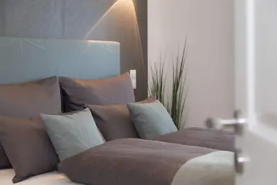 Image de hors appartement de vacances de rêve à Scharbeutz - au centre du parc thermal, à 5 minutes de la plage