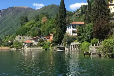 Image de Bel appartement directement sur le lac de Lugano avec terrasse au bord du lac privé