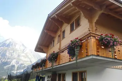 Image de New 2-room apartment with fantastic views of the mountains. Ski in - ski out'!