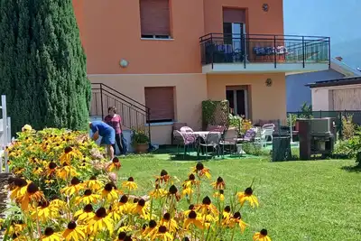 Image de Levico \"Casa Del Sole\" avec son propre jardin, à côté du centre, à 800 mètres de Levicose