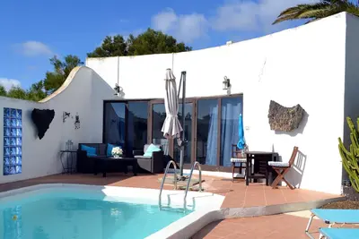 Image de Bungalow avec piscine privée dans un jardin privé