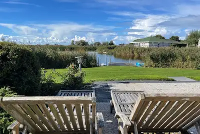 Image de Fh avec belle vue IJsselmeer et eig. Mise à l'eau / sauna