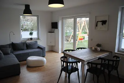 Image de Appartement au rez-de-chaussée joliment meublé - résidence secondaire pour les familles et les frisons