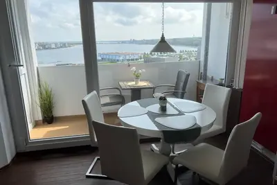 Image de Appartement confort avec vue imprenable sur la mer Baltique / lac - accès au sauna
