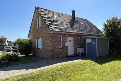 Image de Confort Maison (5 personnes) à seulement 200 mètres de la plage - avec cheminée et chaise de plage