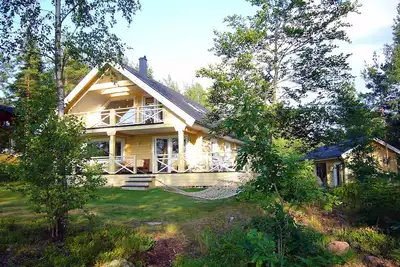 Image de Idylle au bord du lac, équipement de luxe - sauna, bateau, WiFi