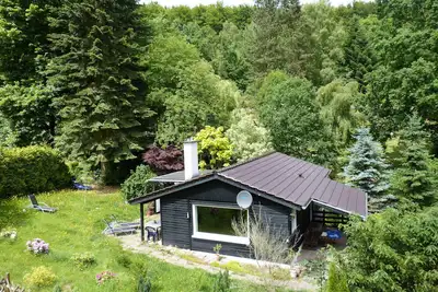 Bungalow en bois dans le parc naturel de Reinhardswald avec 1 000 m² de terrain - près de Kassel