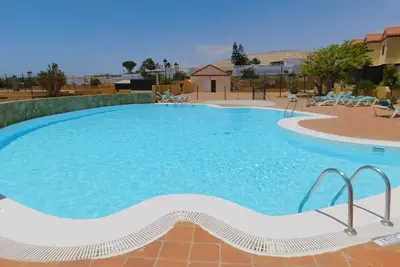 Duplex dans un complexe avec piscine communautaire