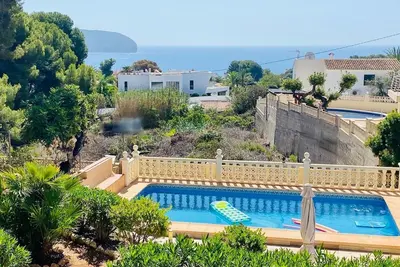 Image de Maison de vacances à Moraira avec une belle vue sur la mer, piscine privée, Internet, A / C