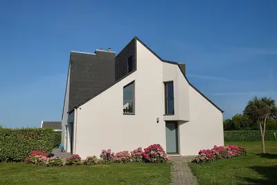 Image de Belle maison de bord de mer dans un environnement protégé