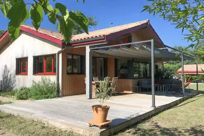 Image de Belle maison bois récente et confortable, à 200m lac, en bord de piste cyclable