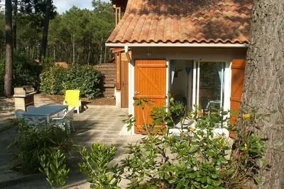 Image de Maisonnette sous la pinède, dans résidence avec 2 piscines ; grande terrasse
