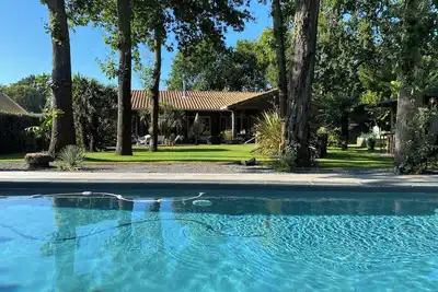 Image de Charmante maison bois avec grand jardin arboré