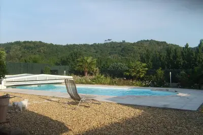 Image de Top Confort Mobilhome 35m² sur terrain privé et arboré de 800 M². piscine privée