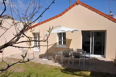 Image de Jolie maison de bord de mer avec terrasse et jardin plein sud