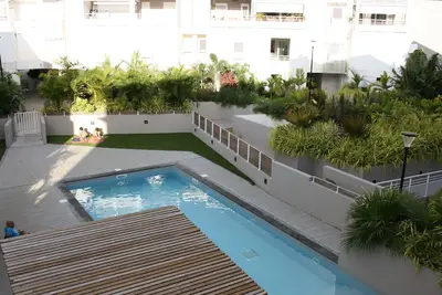 Appartement T2 avec piscine Hermitage à 150 m du lagon.