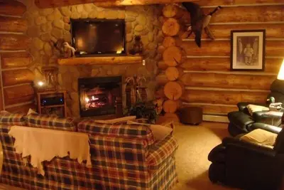 Image de Cabin personnalisée journal au coeur de la forêt nationale Manistee