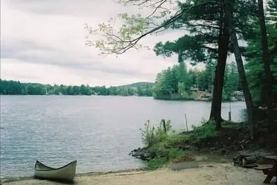 Image de Location Cottage Maine Lakefront avec Sandy Beach