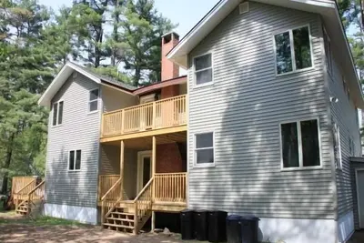 Image de Le Lodge - 6 chambre / salle de bain 7 Familiale Chambre avec vue sur le lac