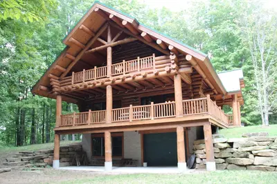 Image de Cabane en rondins dans les bois