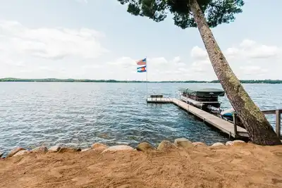 Image de Profitez de la natation, du kayak, du coucher du soleil, de l'écoute des huards et de la détente
